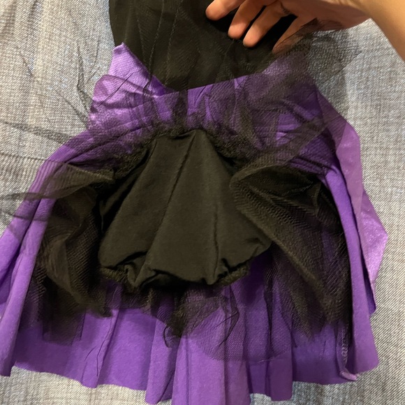 Multi-colored sequin bodice with black straps and snaps around neck. - Picture 6 of 7